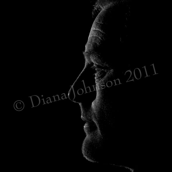 Low key silhouette of male profile